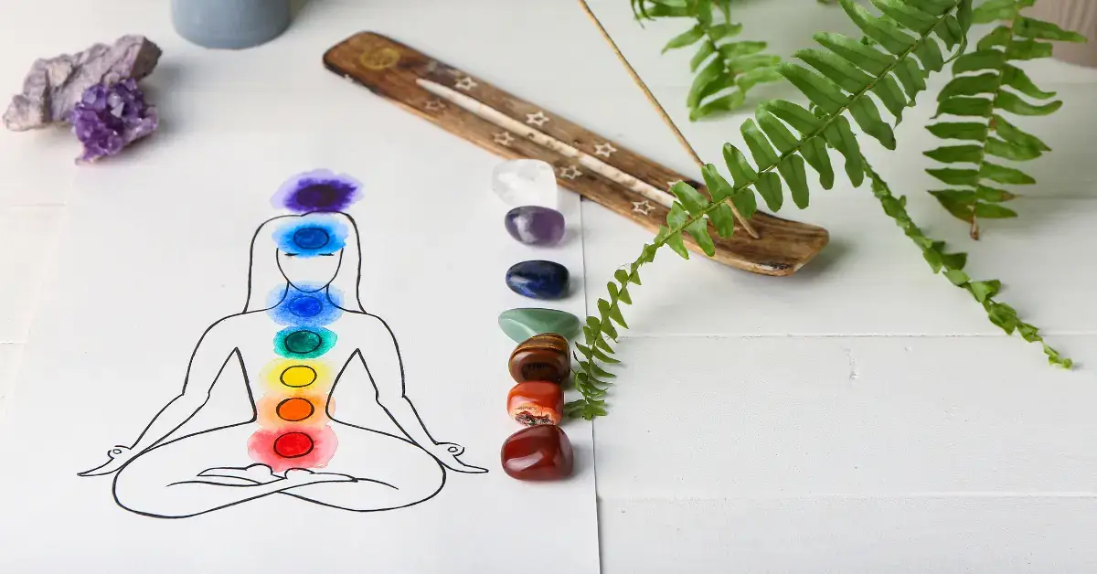 Chakra Meditation: A Guide to Balancing Energy Centers 2024 1 Chakra Meditation: there is a picture with the chakras and stones.