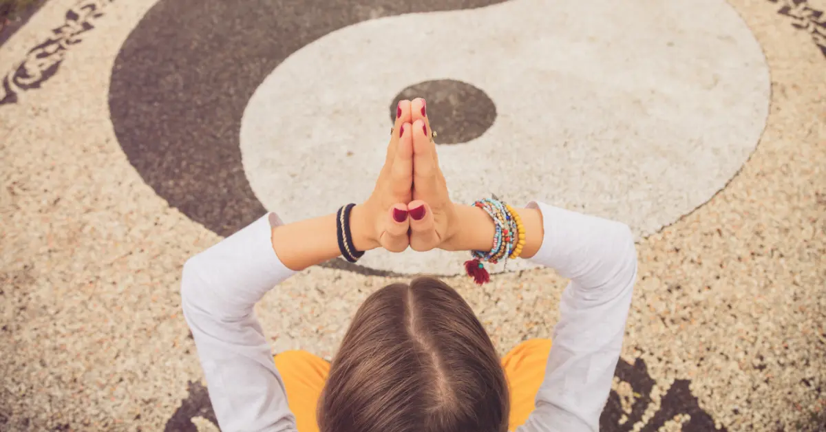 8 Meditation Hand Signs You Must Know 2024 1 Meditation Hand Signs: a woman is sitting an shows Meditation Hand Signs