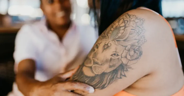 20+ Tattoo Symbol Protection: My Personal Favorites 2024 43 Tattoo Symbol Protection: a woman shoes her tattoo on her arm
