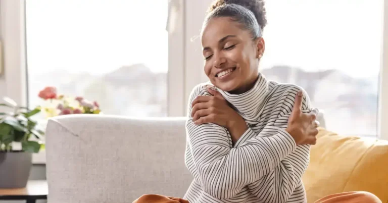 Meditation for Self-Love: Enhancing Your Inner Journey 2024 7 meditation for self-love: a person hugs herself and is laughing