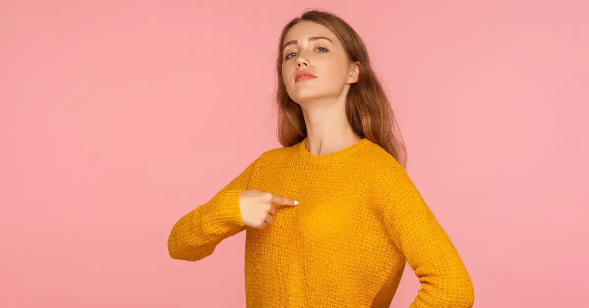 Ego vs Higher Self: Discovering Your True Potential 2024 1 Ego vs Higher Self: a woman shows with her fingers on herself