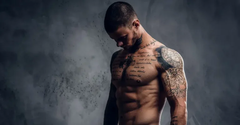 20+ Tattoo Symbol For Strenght You Must Know 2024 61 Tattoo Symbol For Strenght: a man with a lot of tattoos